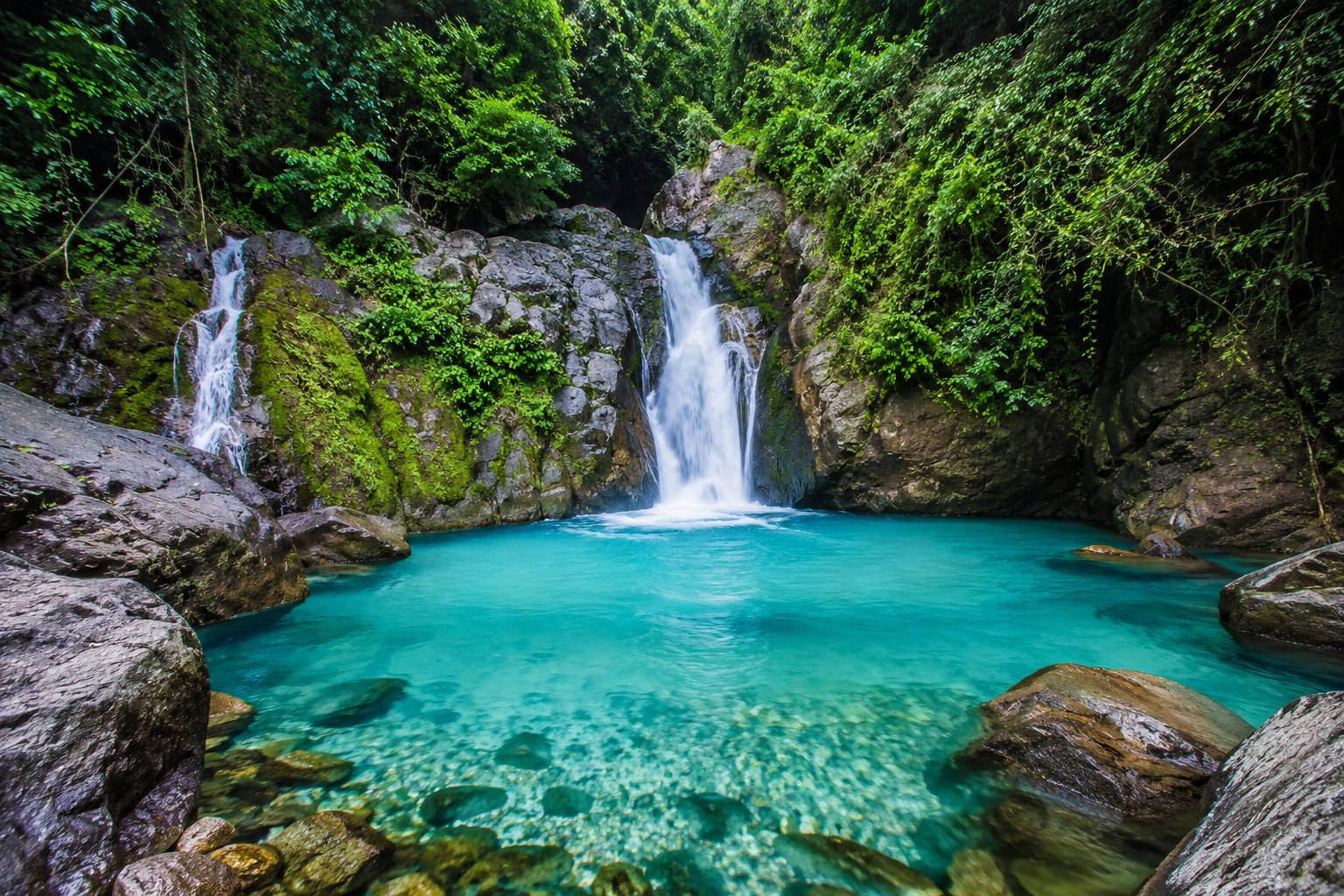 Curug Cibaliung: Finding a Hidden Blue Paradise in the Forest of Babakan Madang